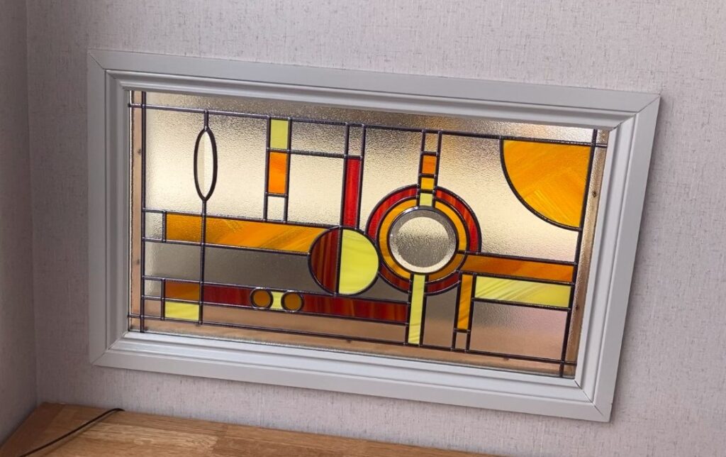 Mackintosh Renfrew Range overlay stained glass panel in a white frame, made for a kitchen serving hatch in Southampton